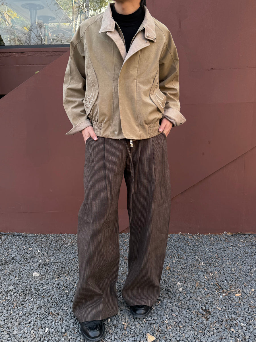 Quiet outerwear, easy proportions.